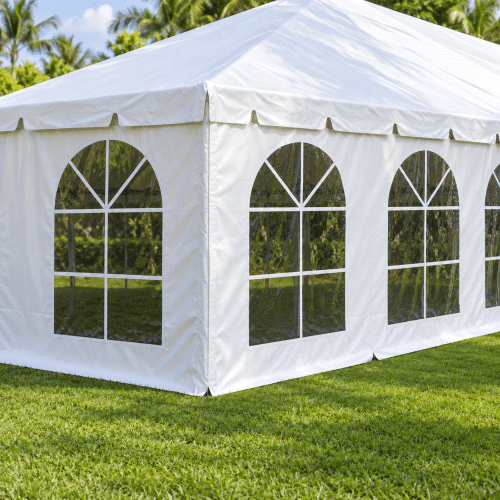 White cathedral tent sidewalls with large arched clear windows