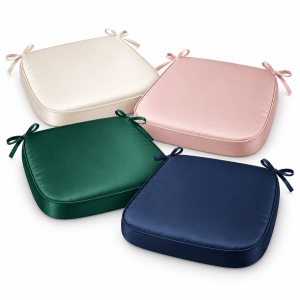 Satin Chiavari chair pads in ivory, blush pink, emerald green, and navy